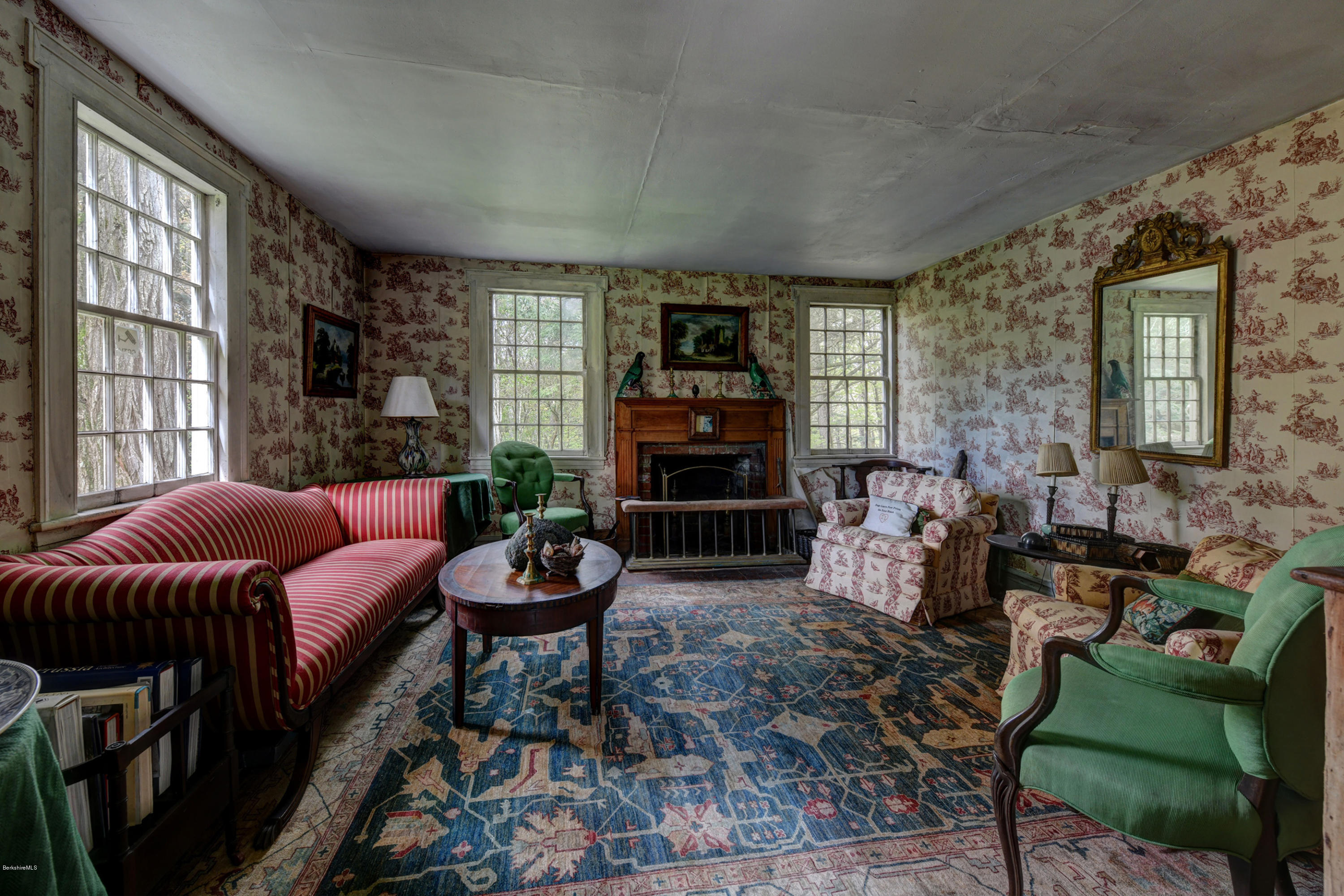 82 Hammertown Road Sandisfield, MA 01255 - Photo 4 of 49 a living room with furniture a fireplace and a large window