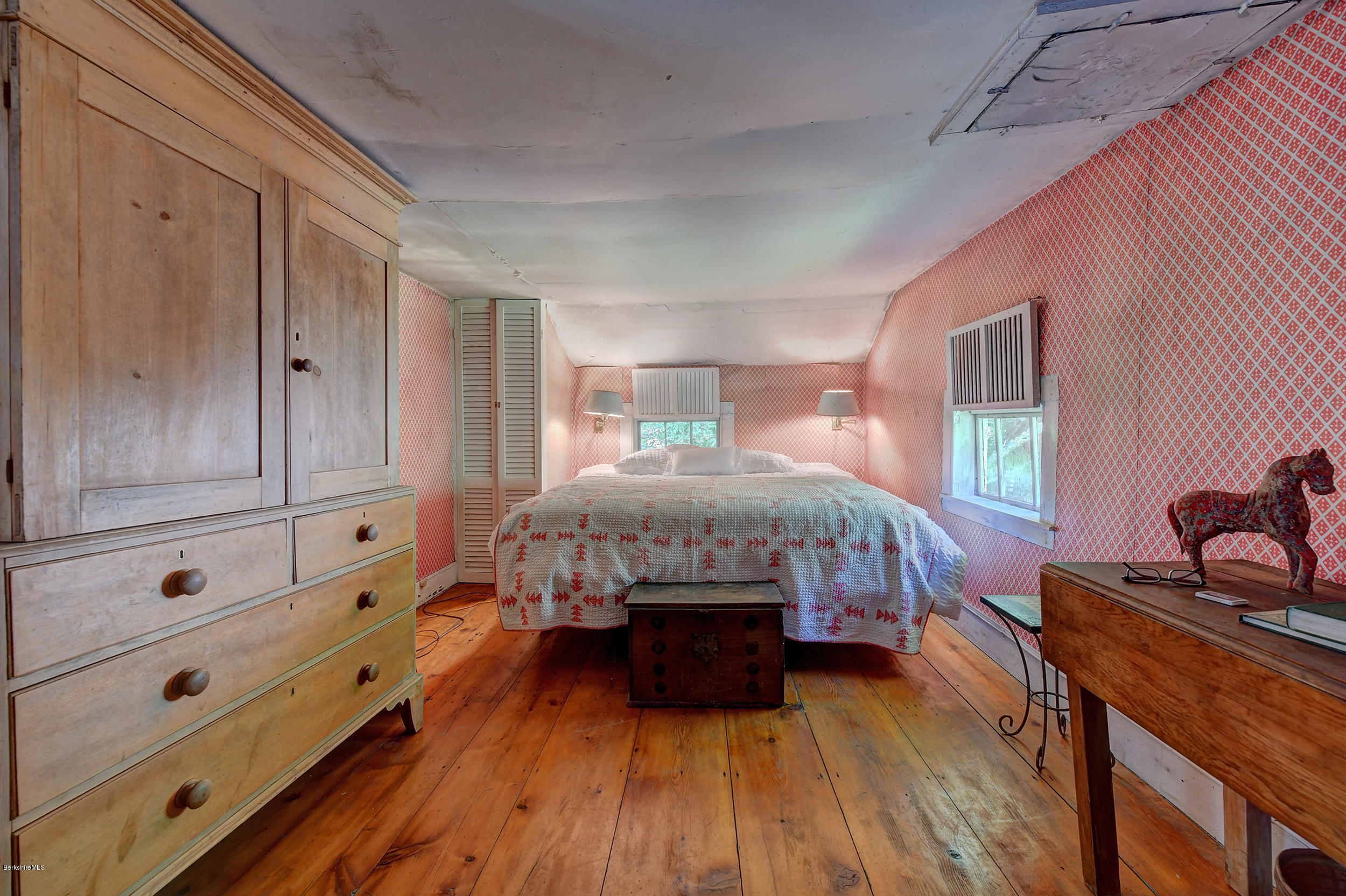 82 Hammertown Road Sandisfield, MA 01255 - Photo 31 of 49 a bedroom with furniture and wooden floor