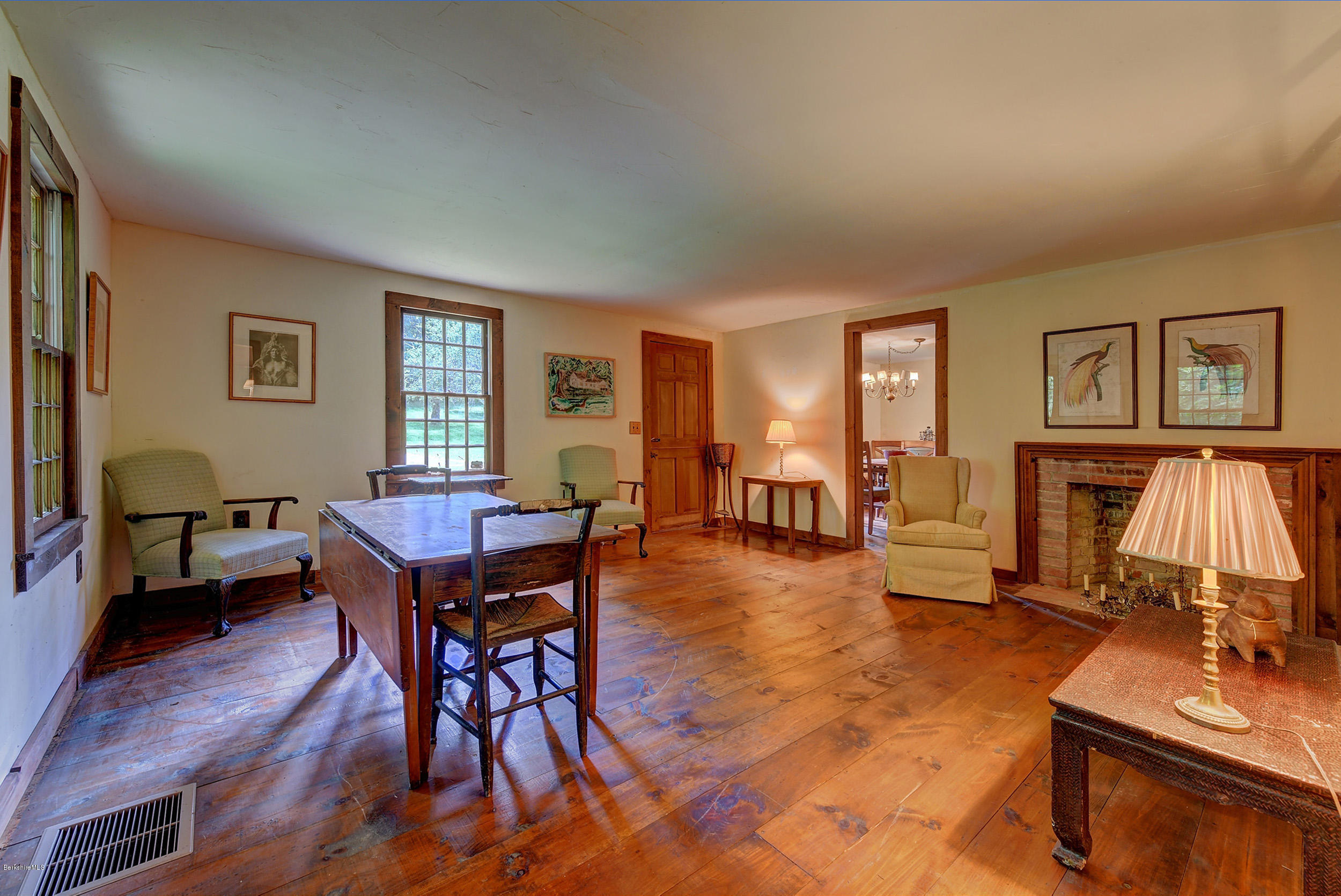 82 Hammertown Road Sandisfield, MA 01255 - Photo 39 of 49 a living room with furniture a fireplace and a window