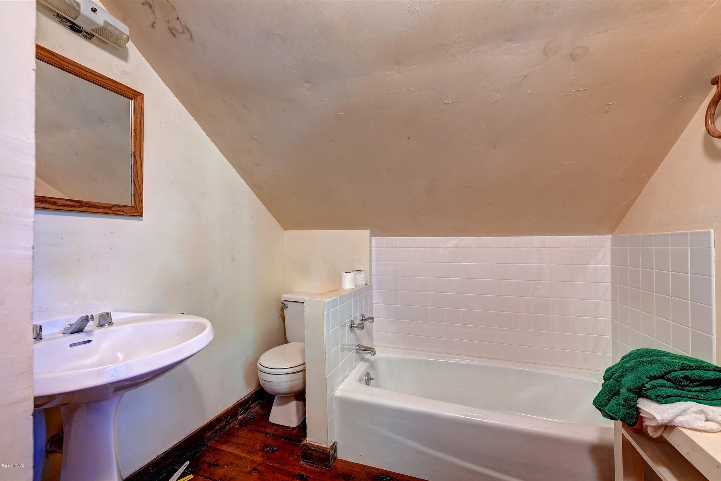 82 Hammertown Road Sandisfield, MA 01255 - Photo 47 of 49 a bathroom with a sink a toilet and bathtub