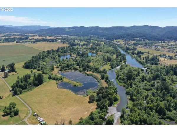 a view of a city with mountains in the background