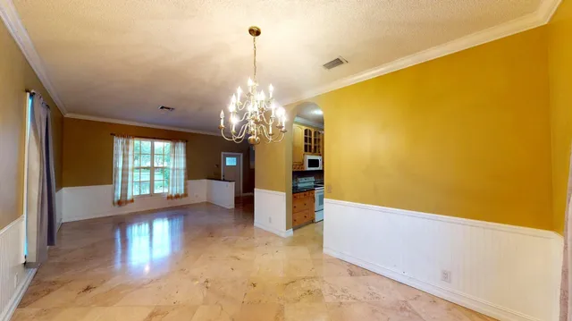 a view of a livingroom with a chandelier