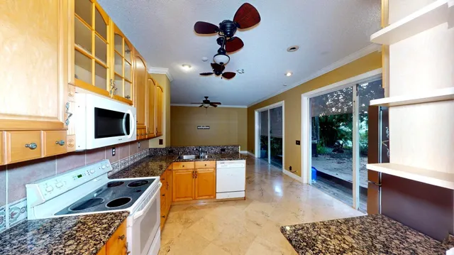 a room with furniture and a flat screen tv