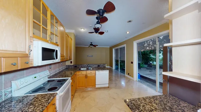 a room with furniture and a flat screen tv