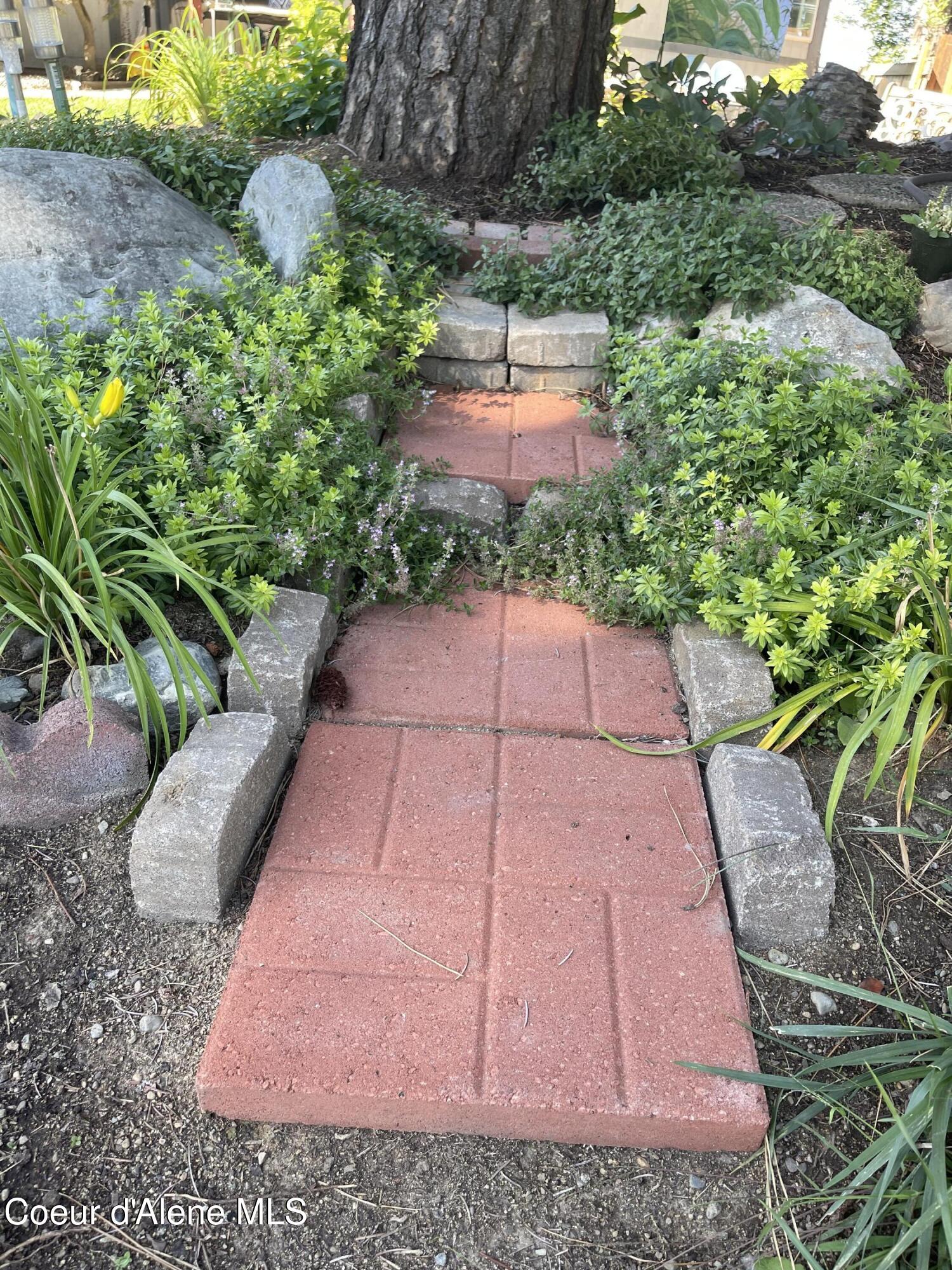 1249 West Shane Drive Coeur D'Alene, ID 83815 - Photo 34 of 42 Front Yard in Spring 4