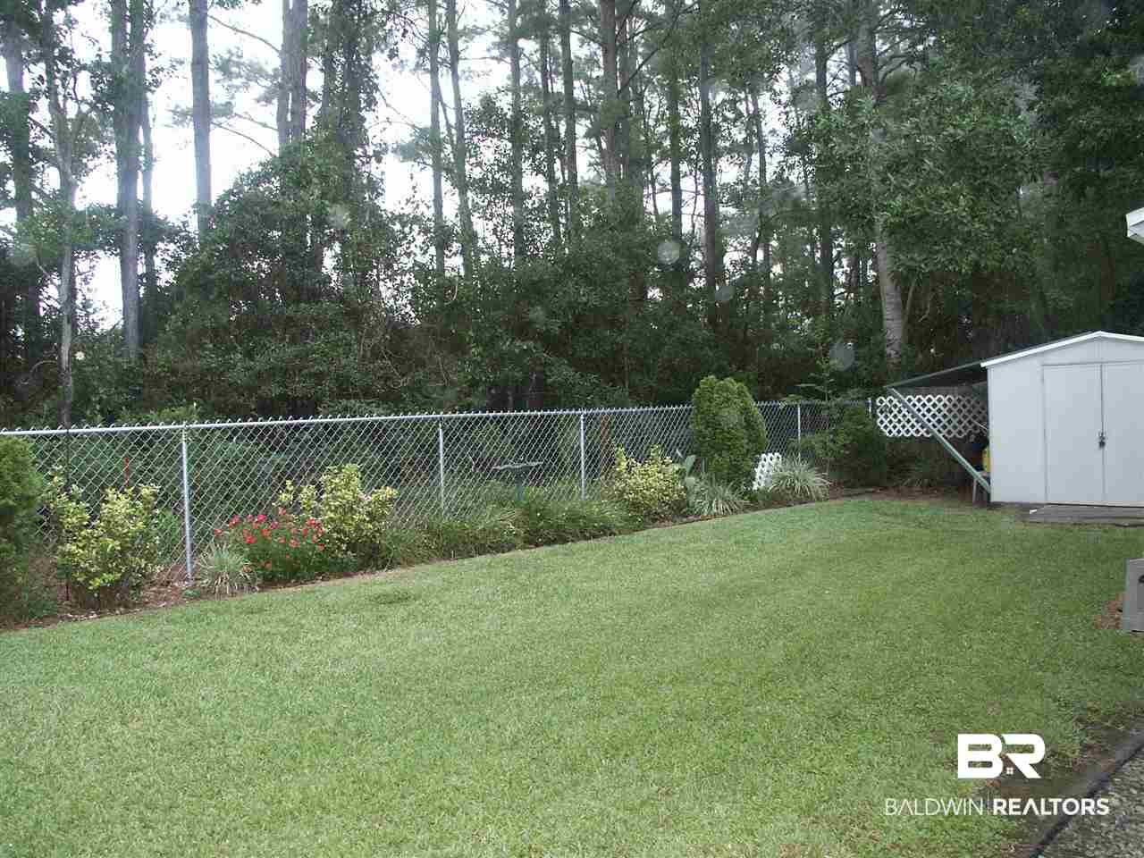 1197 Ridgewood Drive Lillian, AL 36549 - Photo 12 of 21 Fenced Back Yard