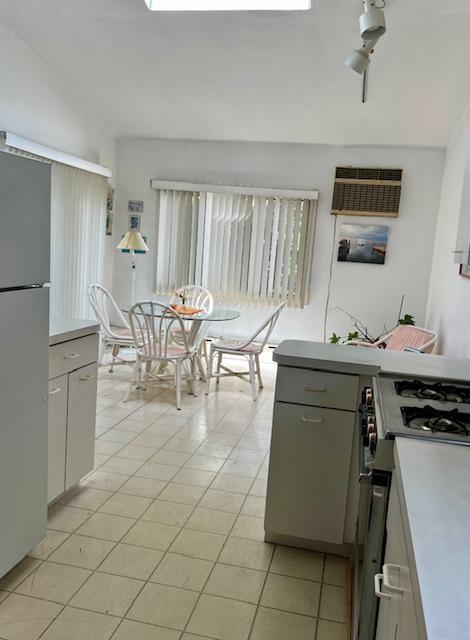2955 Avenue P Brooklyn, NY 11229 - Photo 13 of 22 a living room with furniture and a window