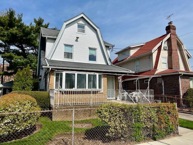 2955 Avenue P Brooklyn, NY 11229 - Photo 2 of 22 a view of a house with a small yard and plants