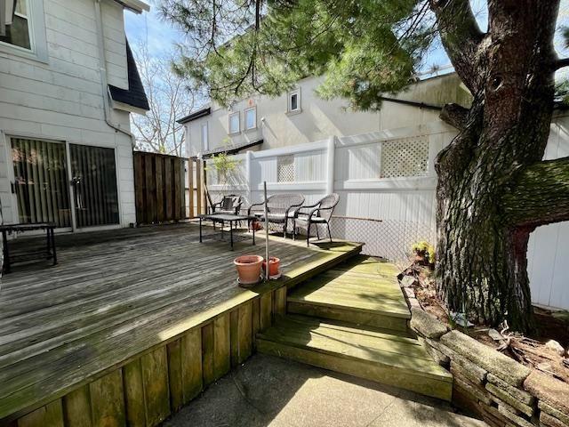 2955 Avenue P Brooklyn, NY 11229 - Photo 3 of 22 a view of a patio with chairs and potted plants