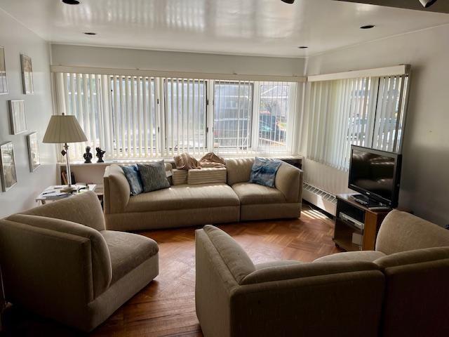 2955 Avenue P Brooklyn, NY 11229 - Photo 6 of 22 a living room with furniture and a large window