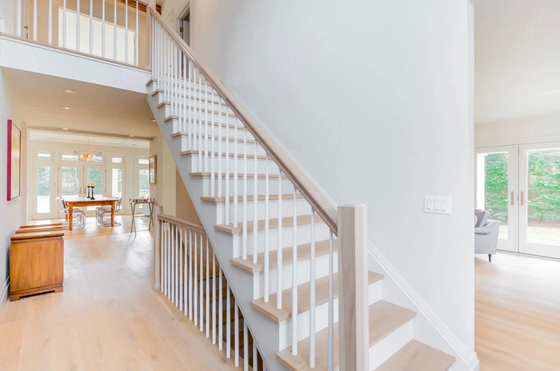 198 Herrick Road Southampton, NY 11968 - Photo 13 of 23 a view of entryway and hall with wooden floor