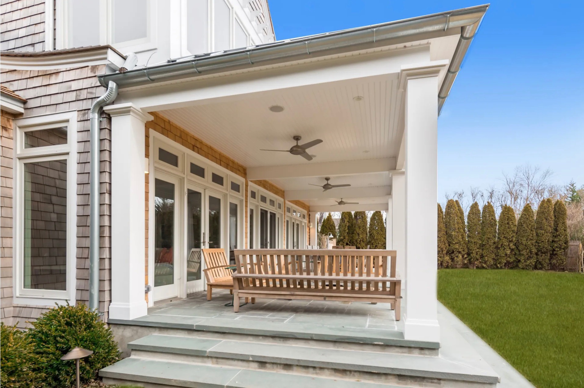 198 Herrick Road Southampton, NY 11968 - Photo 2 of 23 a view of a porch with a garden