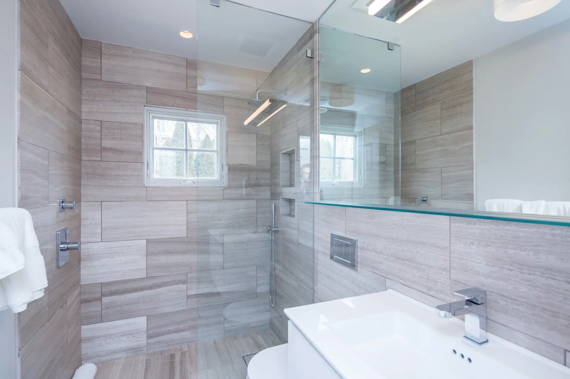 198 Herrick Road Southampton, NY 11968 - Photo 21 of 23 a bathroom with a sink shower and a toilet