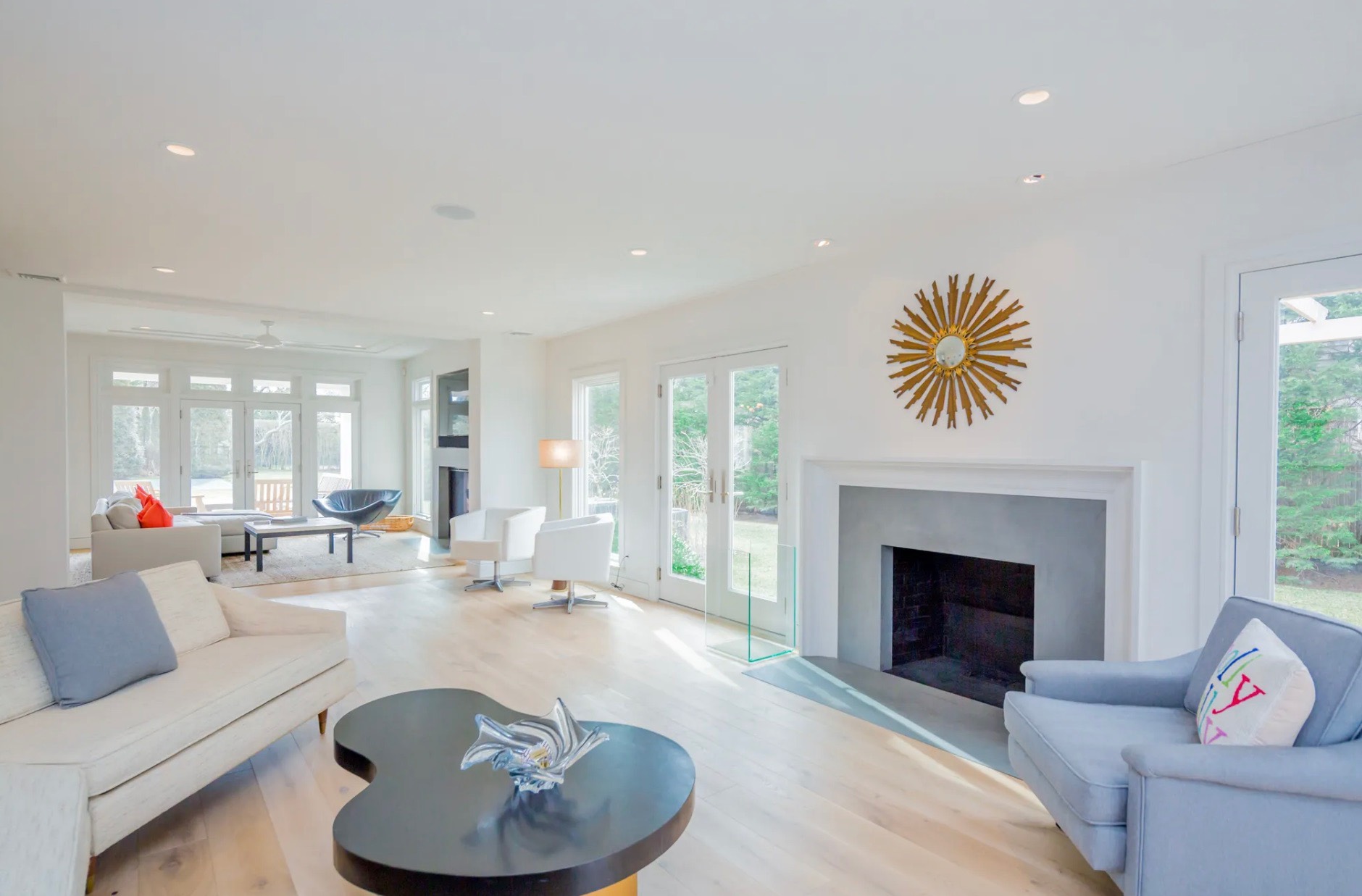 198 Herrick Road Southampton, NY 11968 - Photo 6 of 23 a living room with furniture and a fireplace