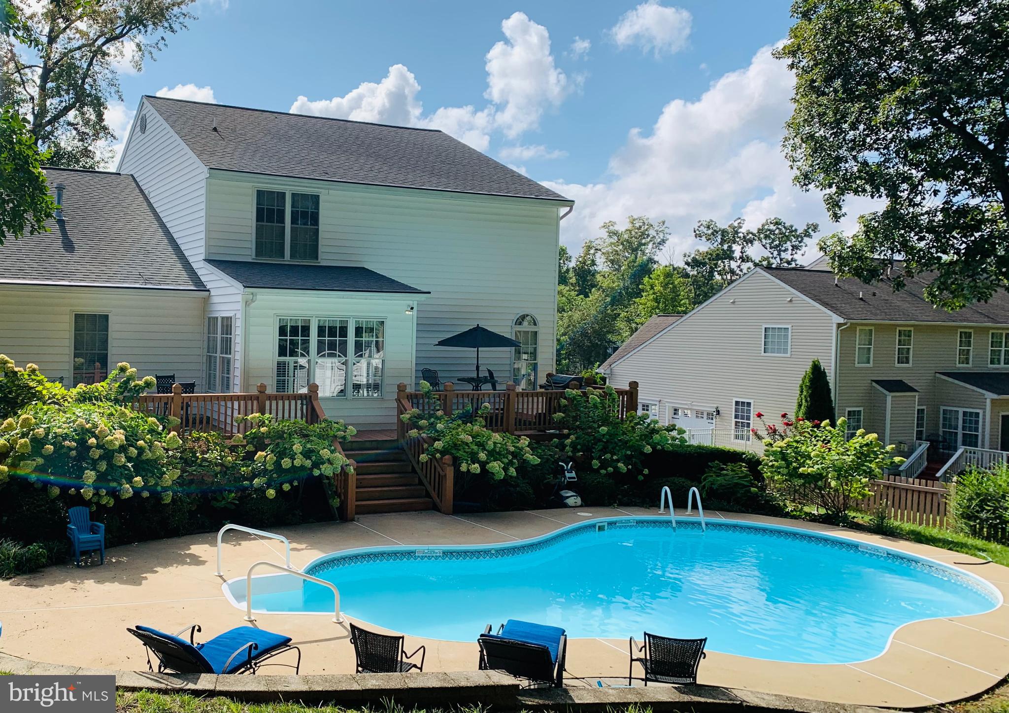 11012 Park Ridge Road Fredericksburg, VA 22408 - Photo 39 of 39 Backyard in it's summer glory. Pool is covered now