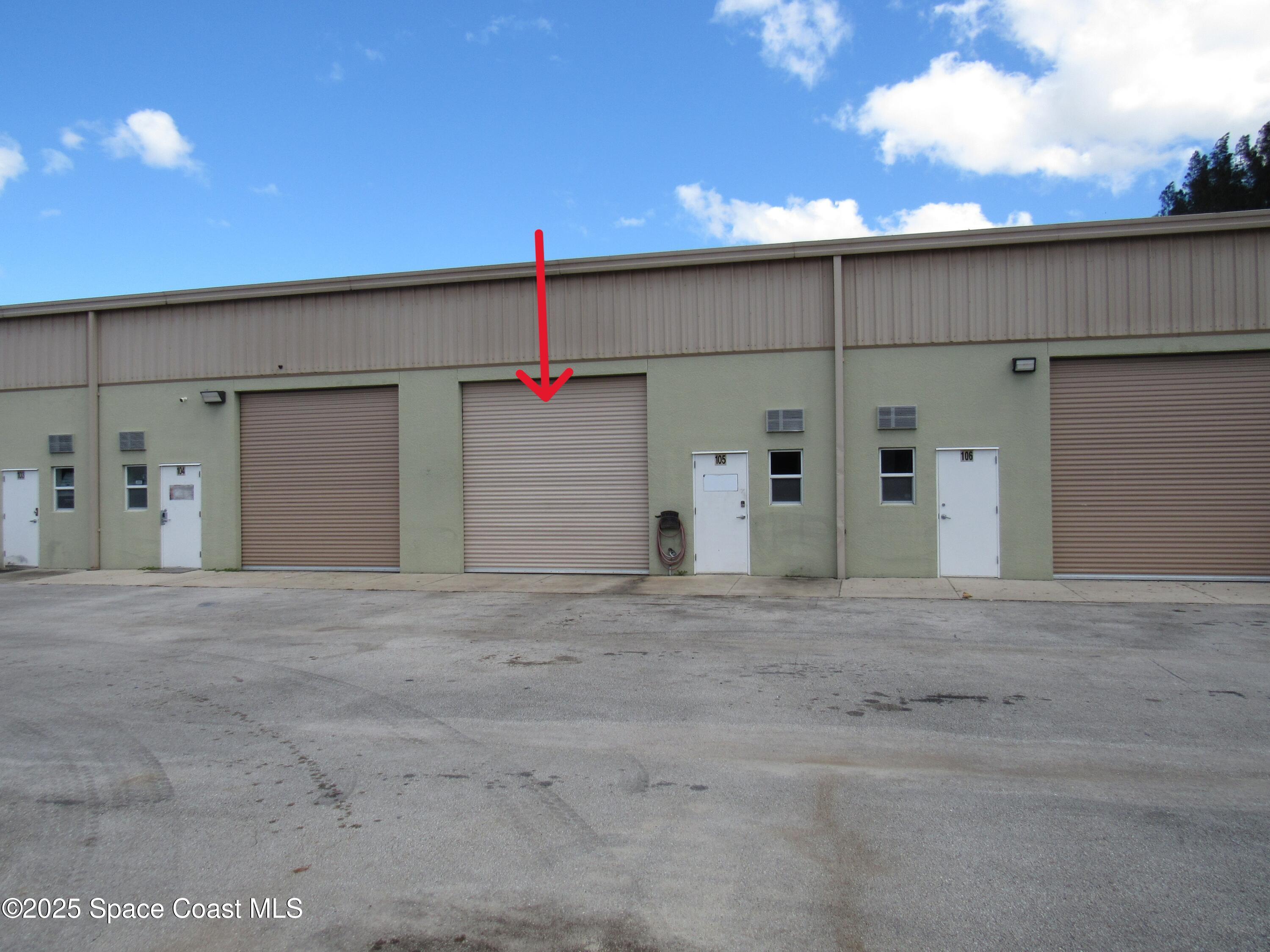 658 Atlantis Road, Unit 105 Melbourne, FL 32904 - Photo 2 of 12 a front view of a building
