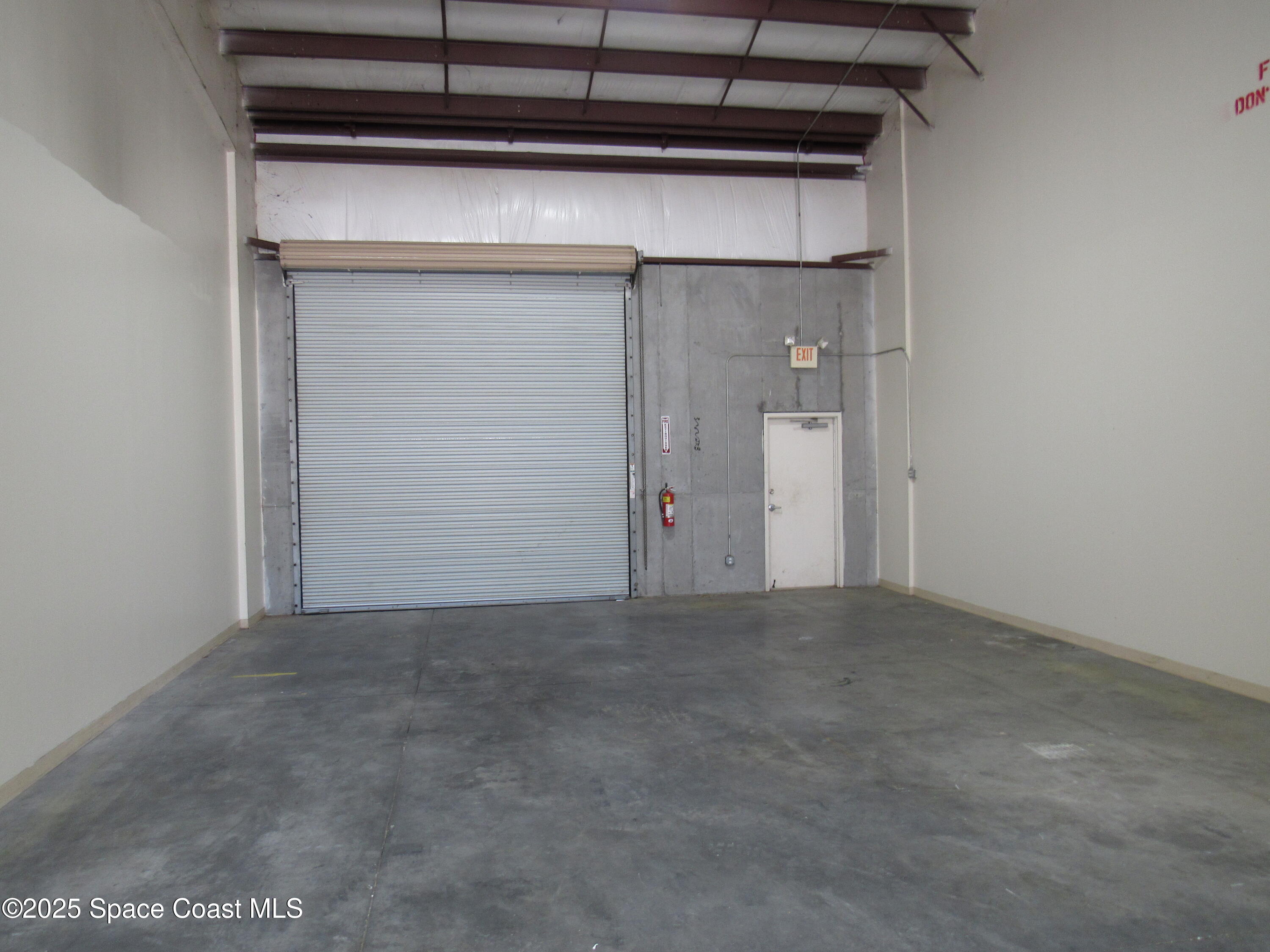 658 Atlantis Road, Unit 105 Melbourne, FL 32904 - Photo 5 of 12 a view of empty room