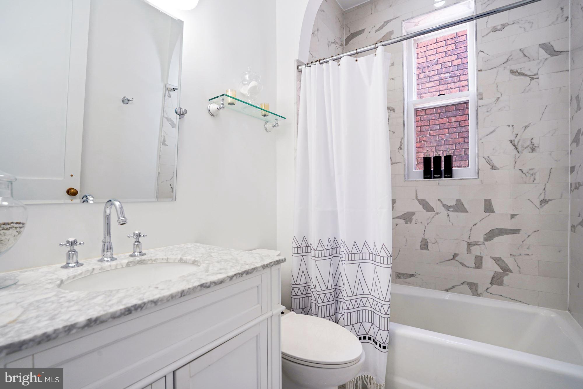 1610 Q Street Northwest Washington, DC 20009 - Photo 23 of 42 Hall Bathroom