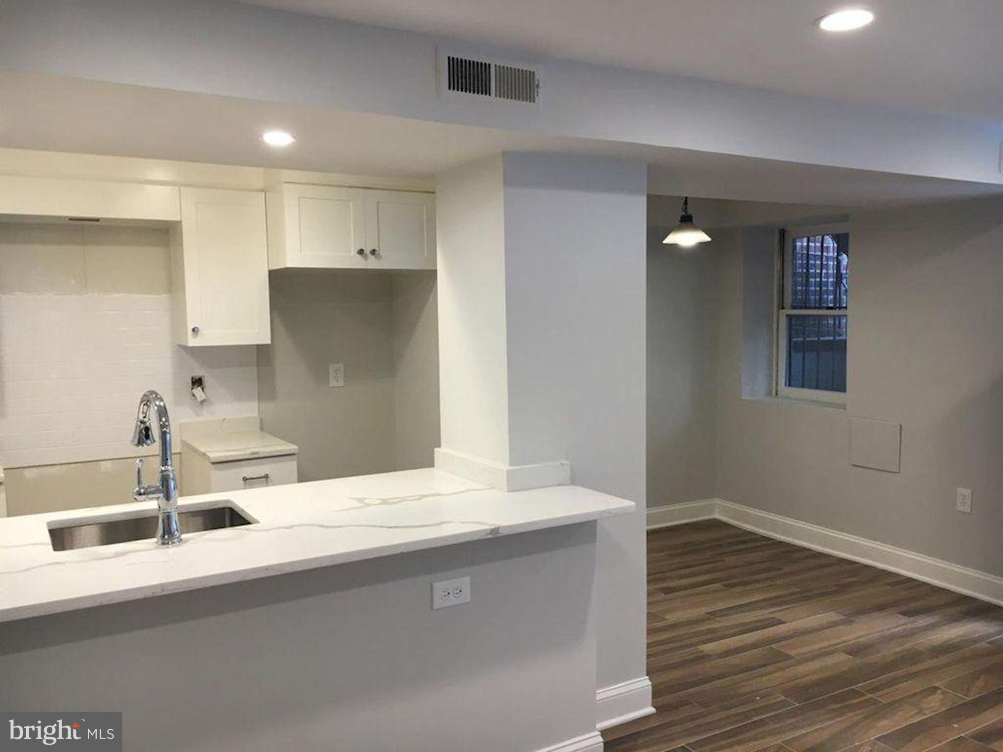 1610 Q Street Northwest Washington, DC 20009 - Photo 38 of 42 Lower Level Rental Kitchen