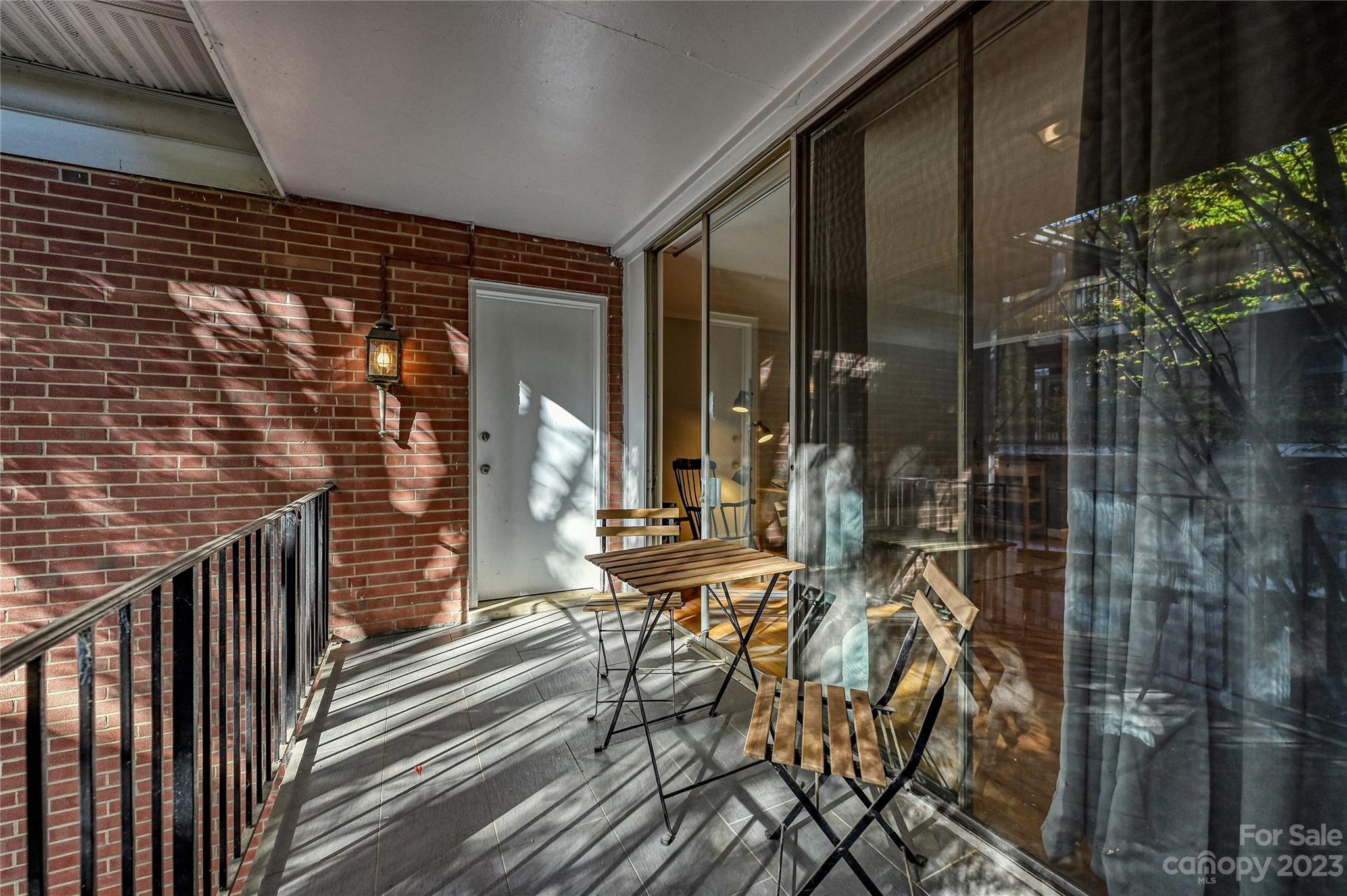 400 Queens Road, Unit B5 Charlotte, NC 28207 - Photo 19 of 20 a view of balcony with wooden floor