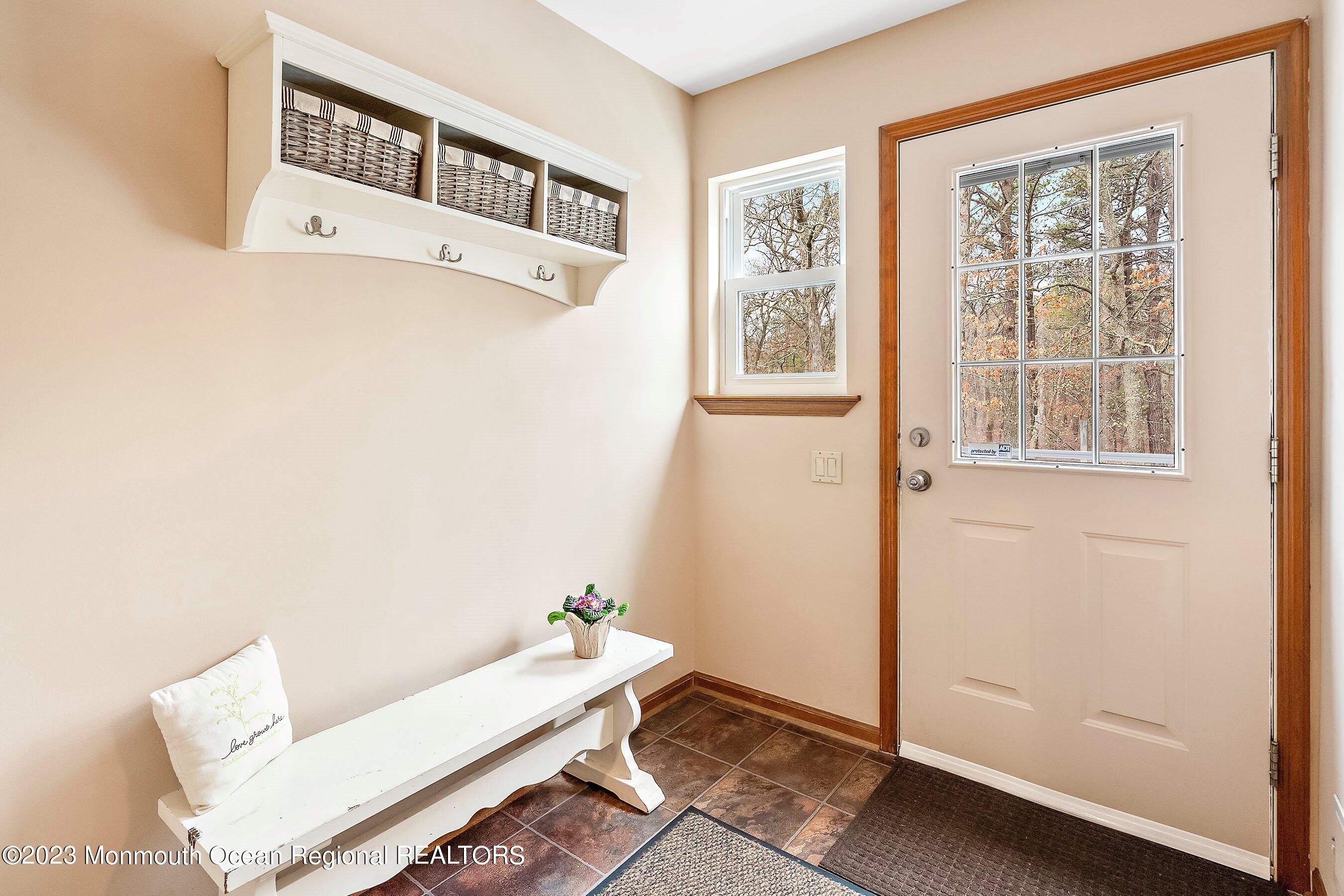310 Easy Street Howell, NJ 07731 - Photo 16 of 45 a room with a window and wooden floor