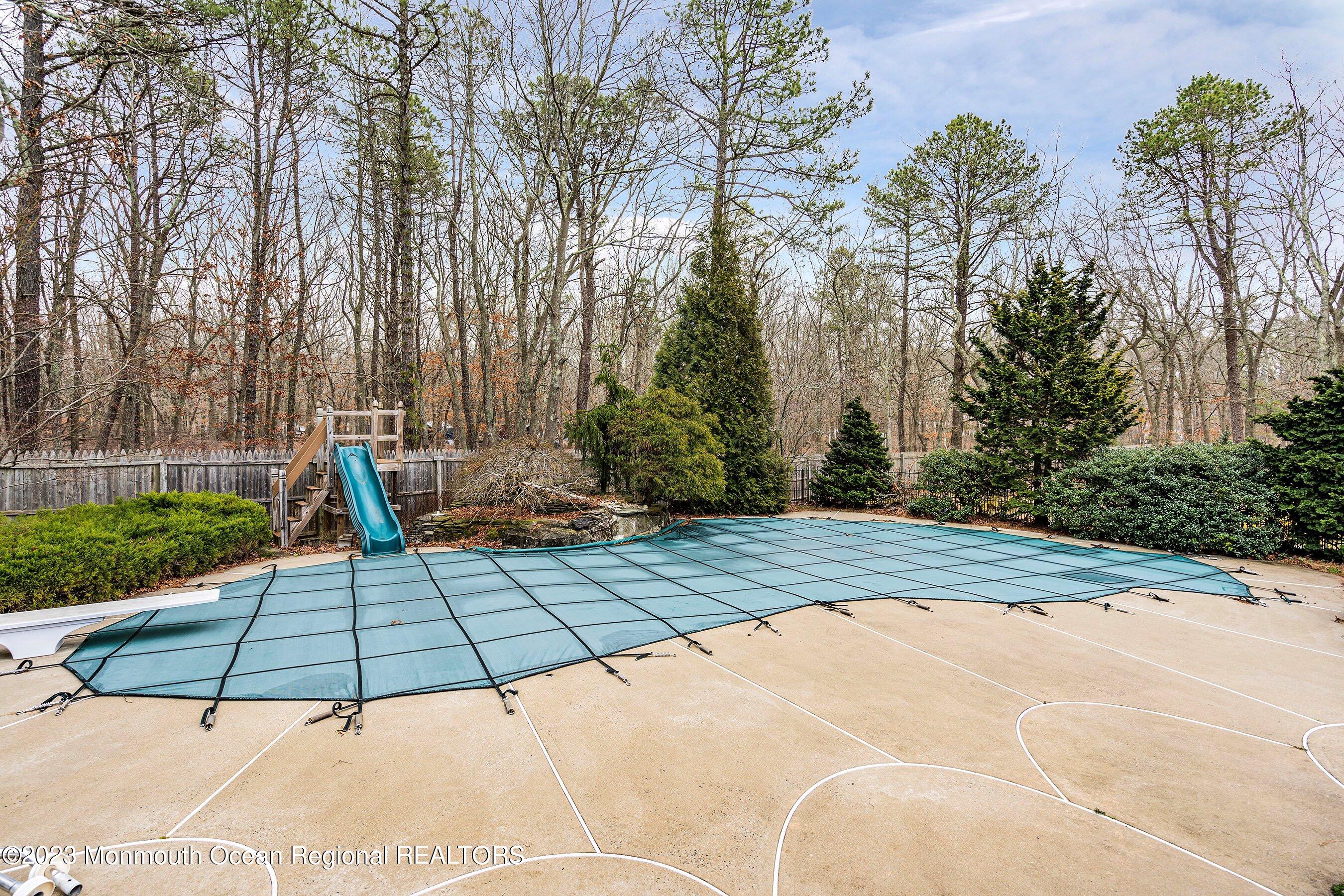 310 Easy Street Howell, NJ 07731 - Photo 35 of 45 a view of a backyard