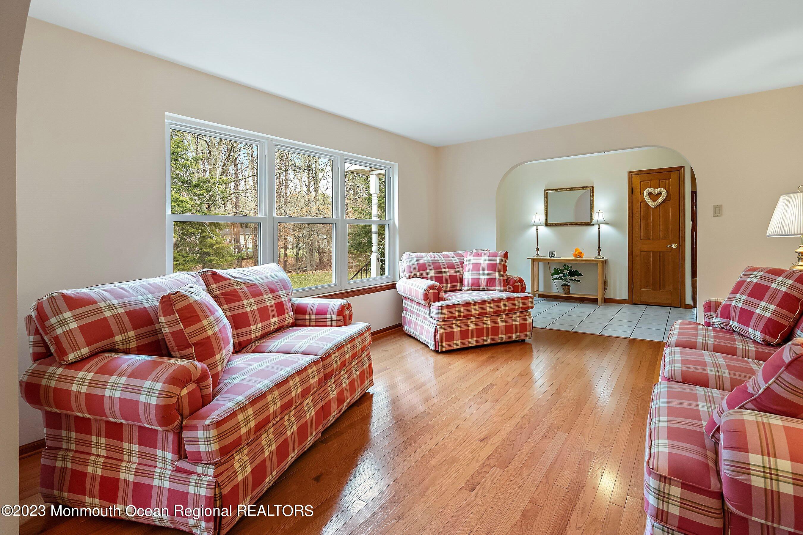 310 Easy Street Howell, NJ 07731 - Photo 7 of 45 a bedroom with furniture and a window