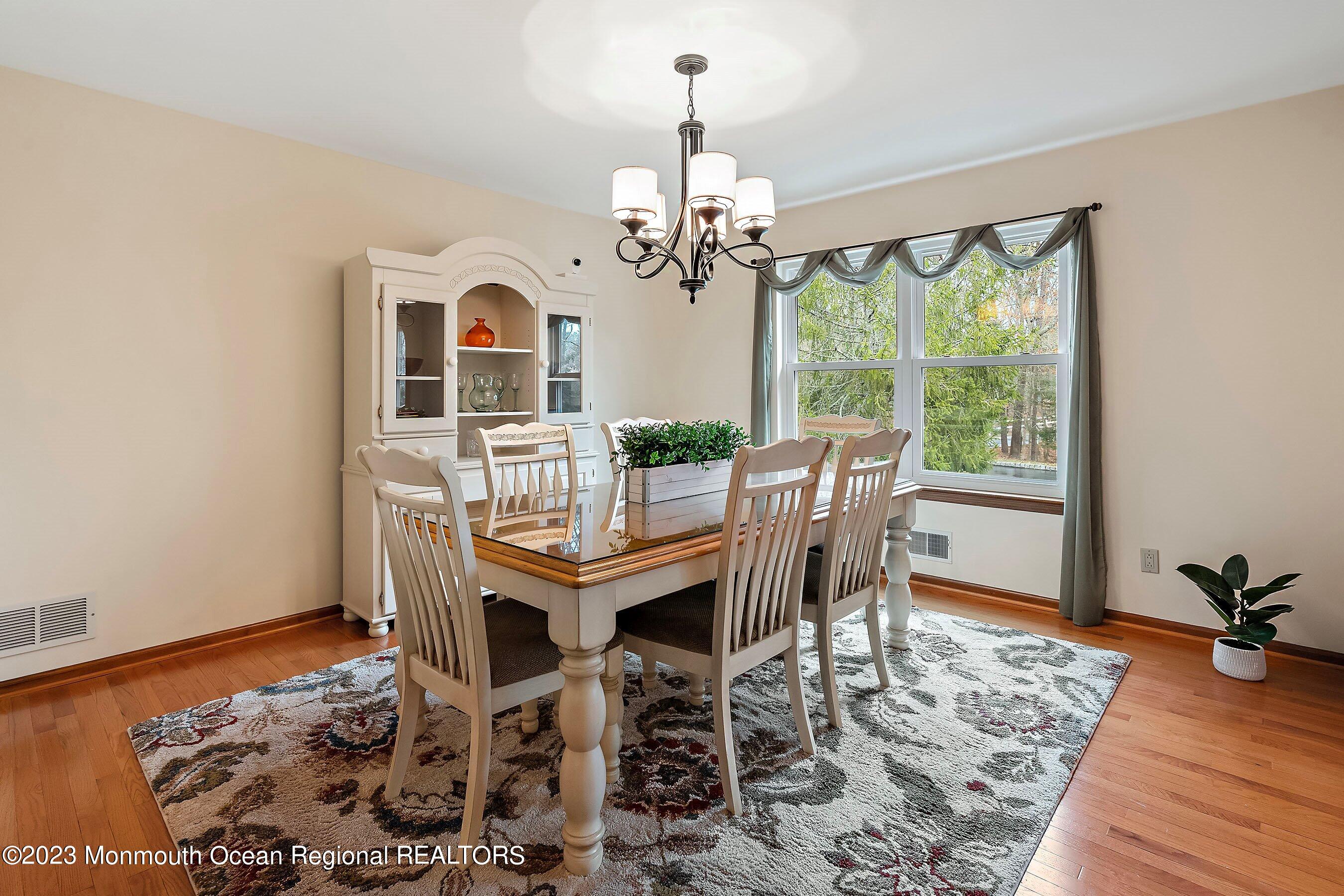 310 Easy Street Howell, NJ 07731 - Photo 9 of 45 a view of a dining room with furniture window and outside view
