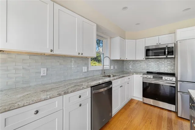 $859,900 | 311 Capron Farm Drive, Warwick, RI 02886