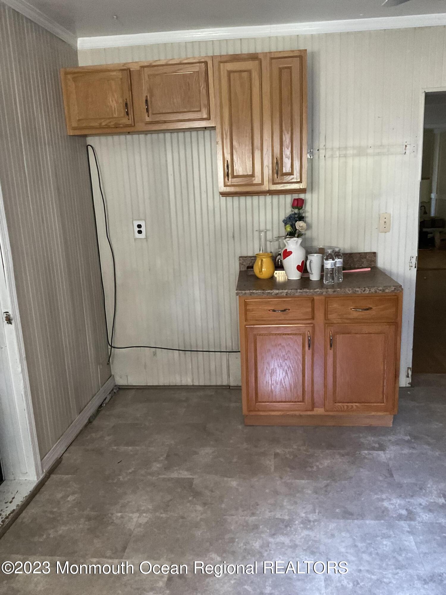 274 Ford Road Howell, NJ 07731 - Photo 15 of 16 a kitchen with stainless steel appliances granite countertop a refrigerator and a stove