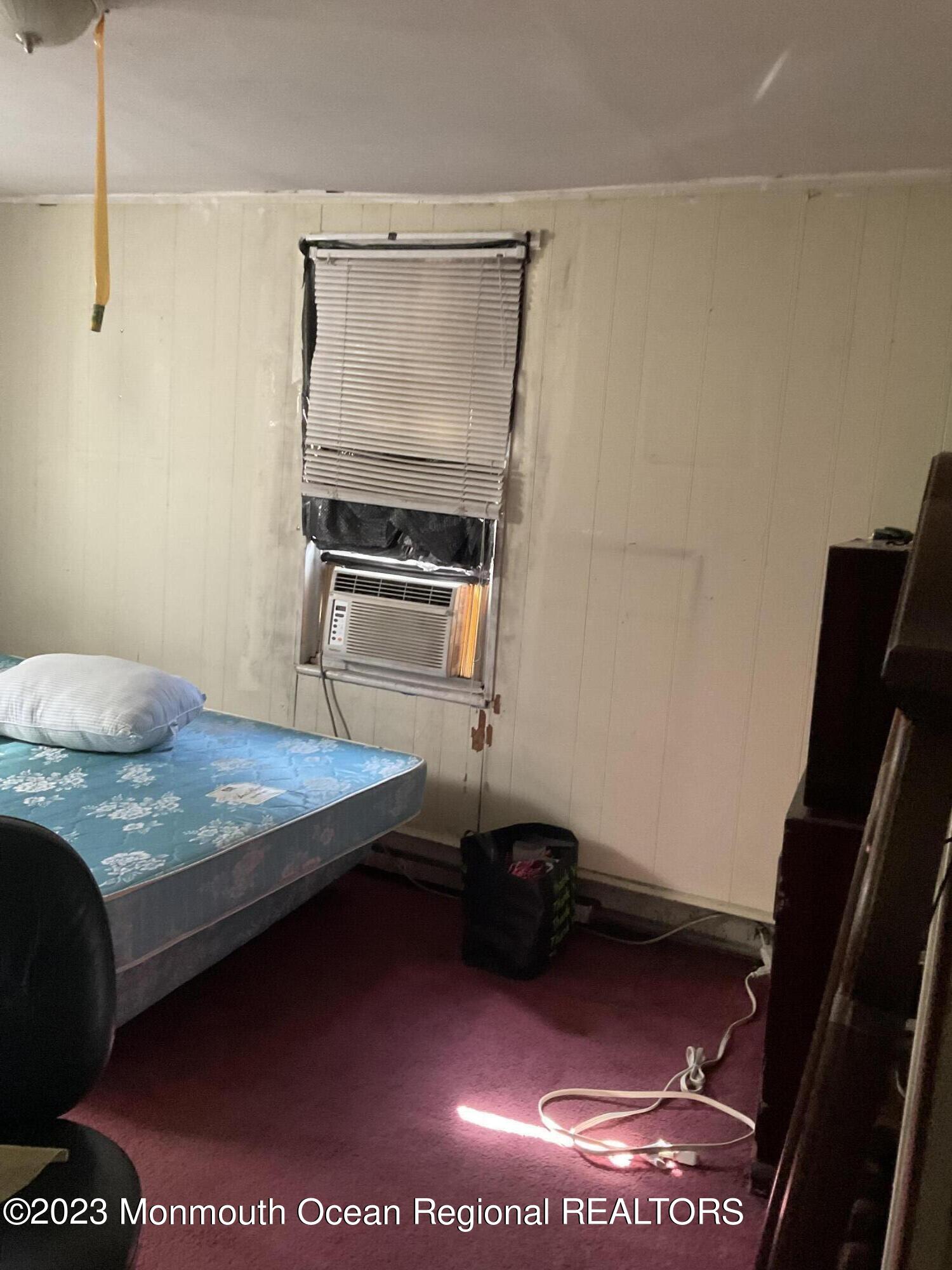 274 Ford Road Howell, NJ 07731 - Photo 5 of 16 a bedroom with a bed and a mirror