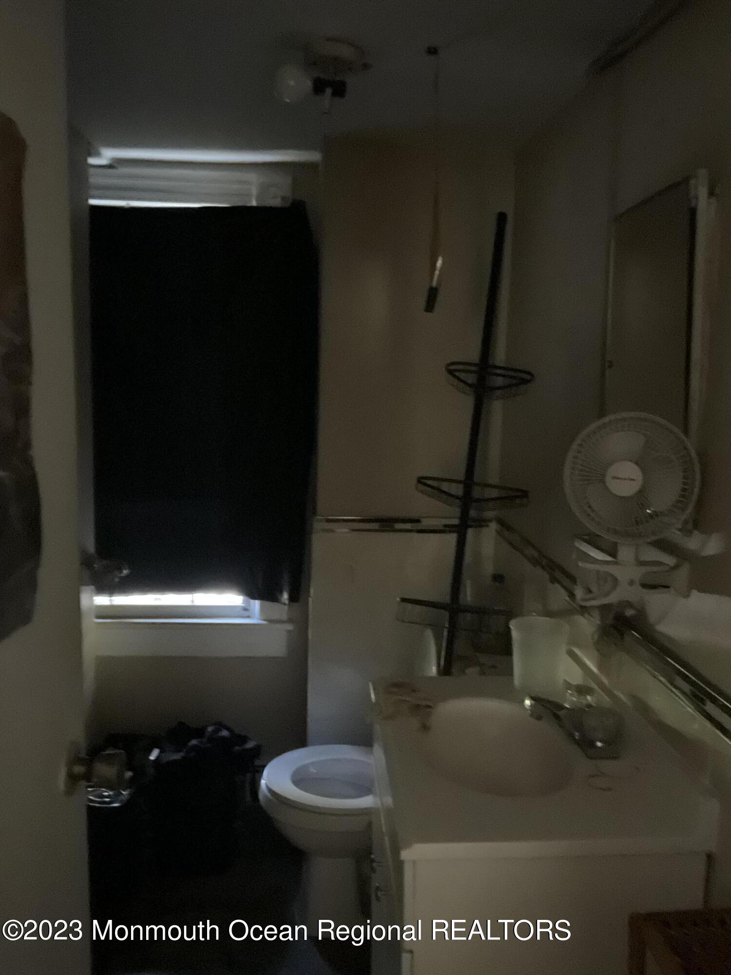274 Ford Road Howell, NJ 07731 - Photo 7 of 16 a bathroom with a toilet and a sink