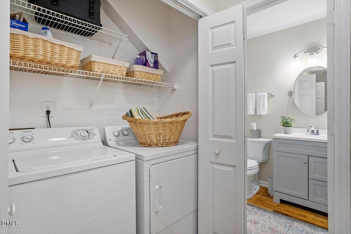 8321 Hempshire Place, Unit 103 Raleigh, NC 27613 - Photo 12 of 25 a utility room with dryer and washer