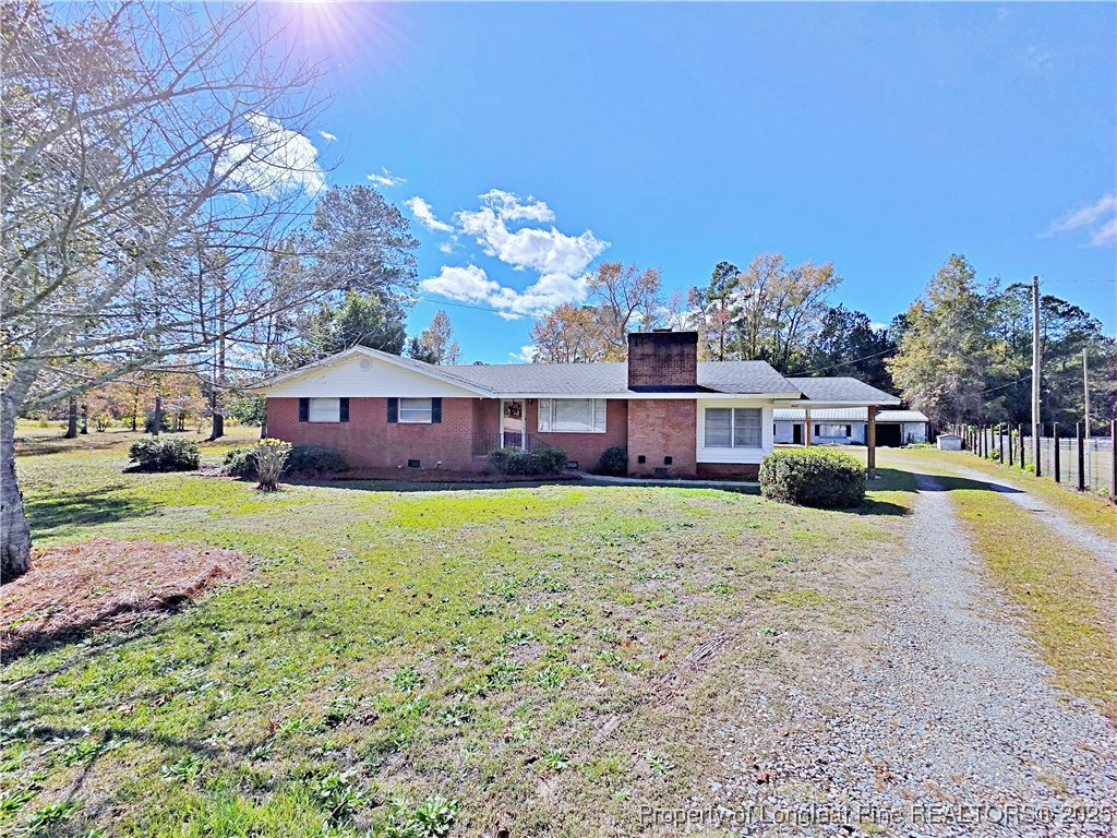 764 Old Vander Road Fayetteville, NC 28312 - Photo 2 of 50 a view of a house with a yard