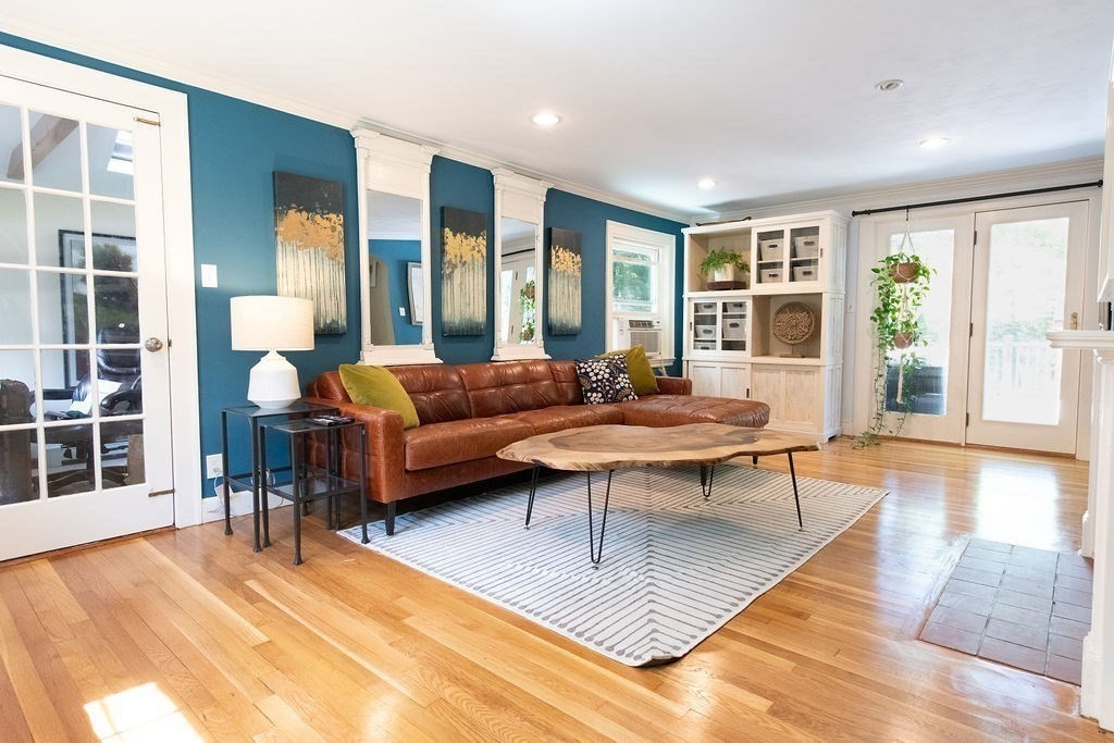 17 Eliot Road Belmont, MA 02478 - Photo 4 of 37 a living room with furniture and a large window