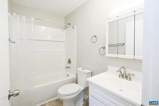 a view of a storage & utility room with washer and dryer