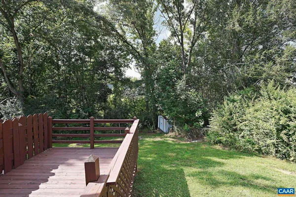 a view of a backyard with a trees