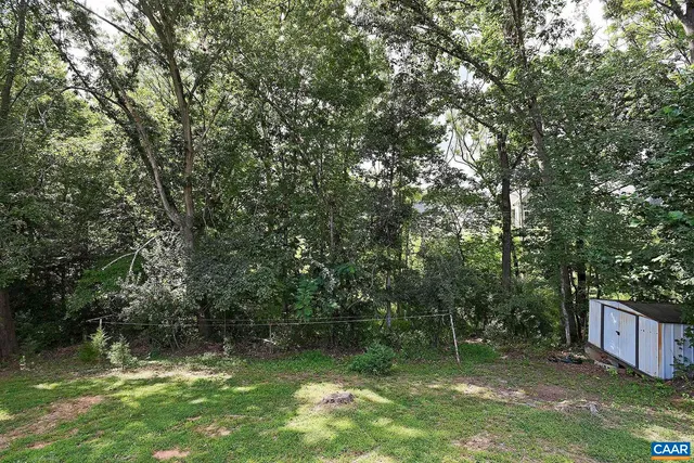 a view of a wooden fence