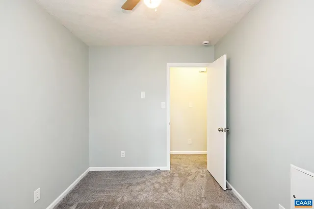 a bathroom with a sink toilet vanity and shower
