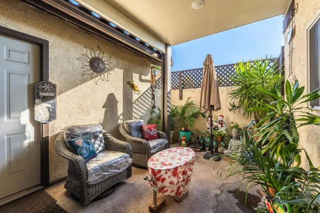 a outdoor living space with furniture and garden view