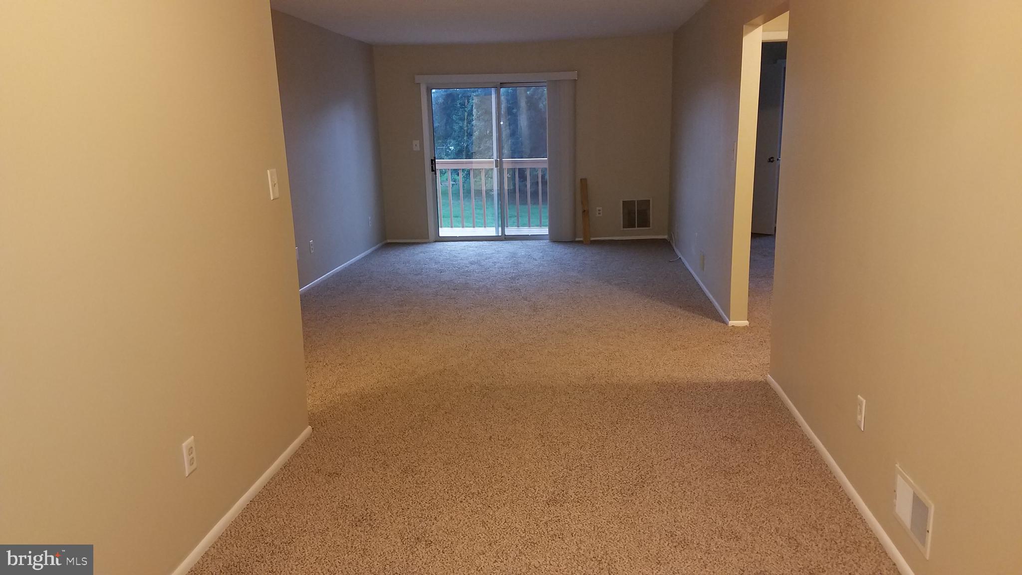 709 Woodchip Road Lumberton, NJ 08048 - Photo 3 of 15 a view of an empty room with a window