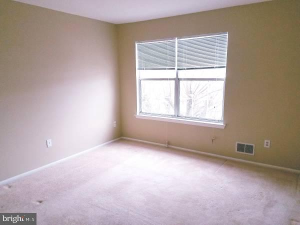 709 Woodchip Road Lumberton, NJ 08048 - Photo 4 of 15 an empty room with a window
