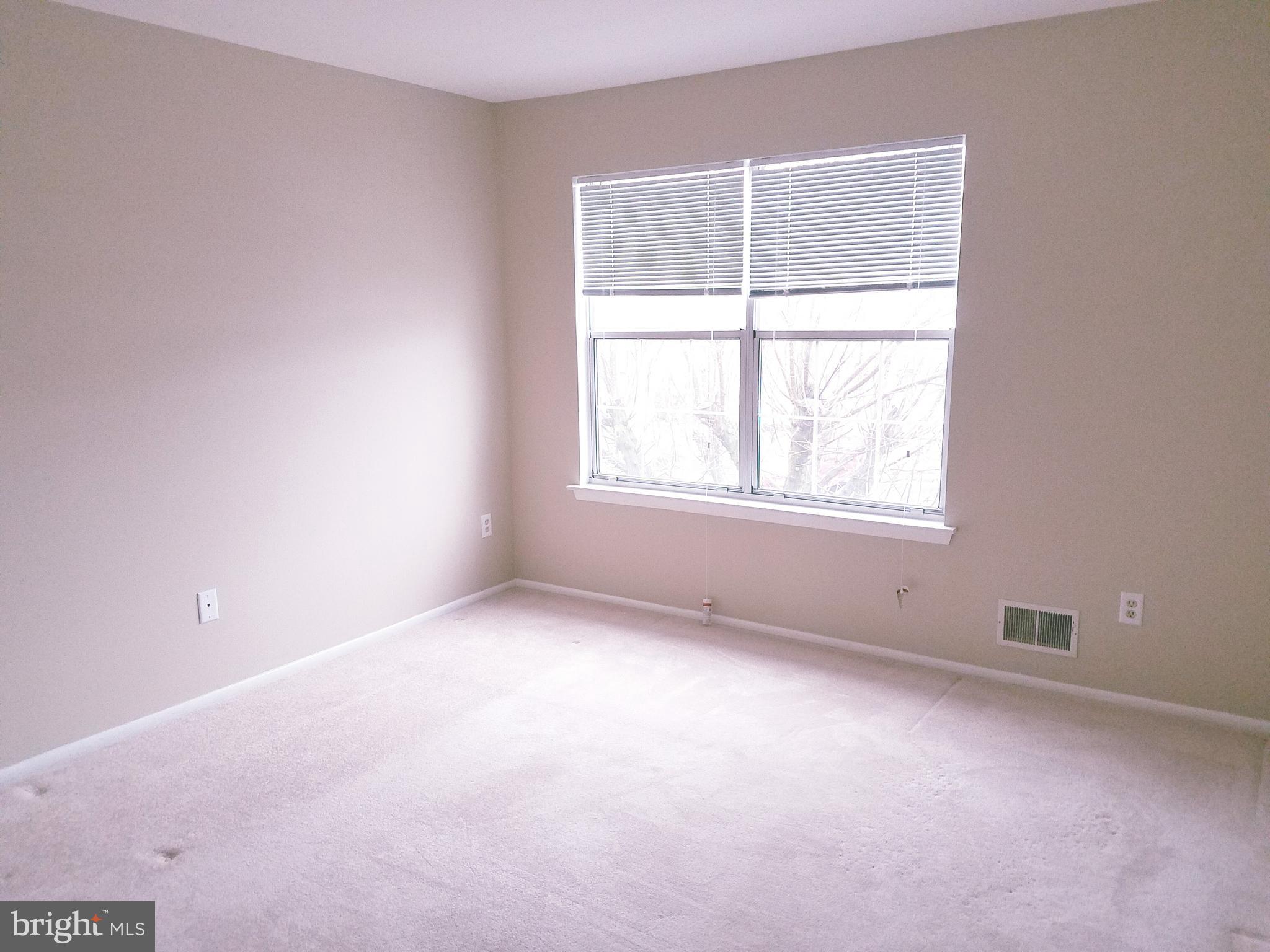 709 Woodchip Road Lumberton, NJ 08048 - Photo 5 of 15 an empty room with a window