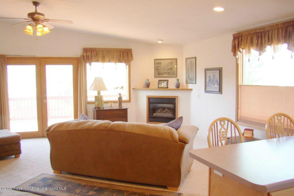 1001 Arnold Court Rifle, CO 81650 - Photo 12 of 39 a living room with furniture and a fireplace