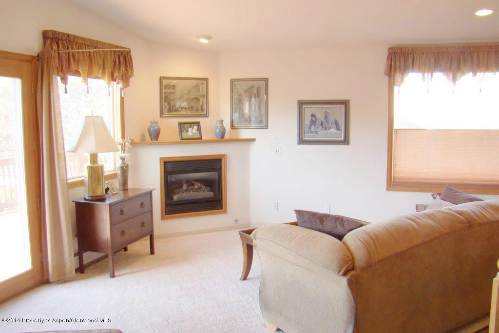 1001 Arnold Court Rifle, CO 81650 - Photo 15 of 39 a living room with furniture and a fireplace