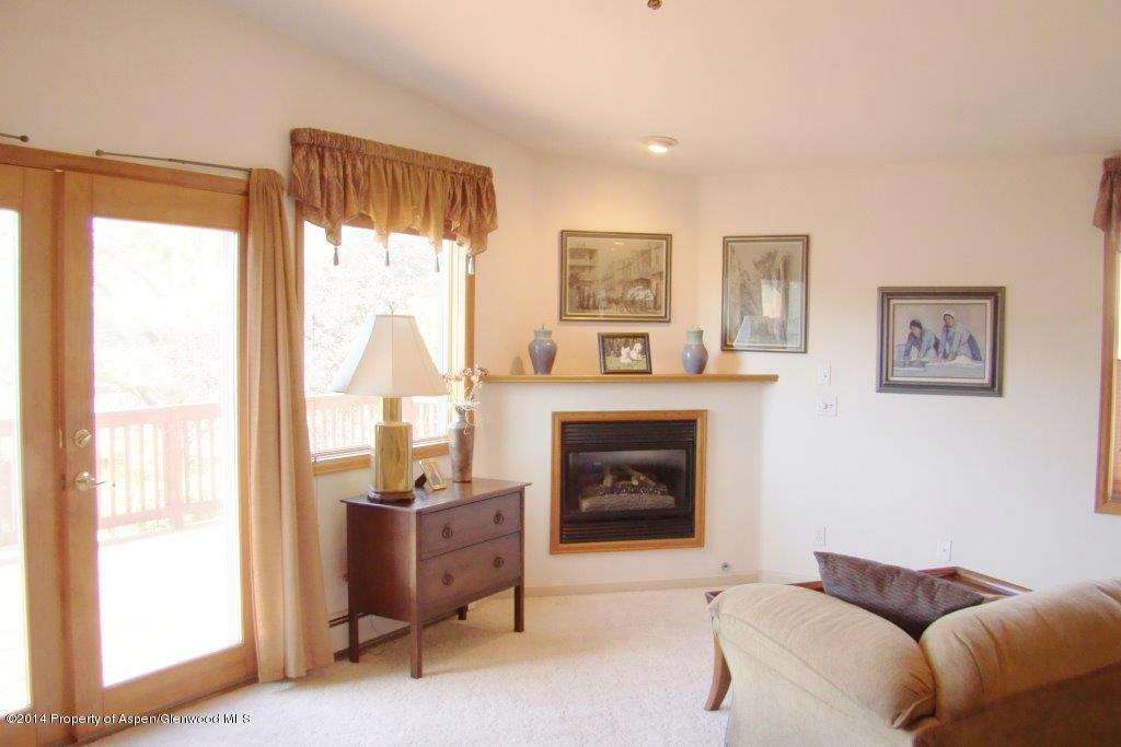 1001 Arnold Court Rifle, CO 81650 - Photo 16 of 39 a living room with furniture and a fireplace