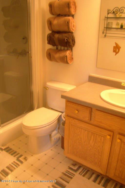 1001 Arnold Court Rifle, CO 81650 - Photo 23 of 39 a bathroom with a toilet and a sink