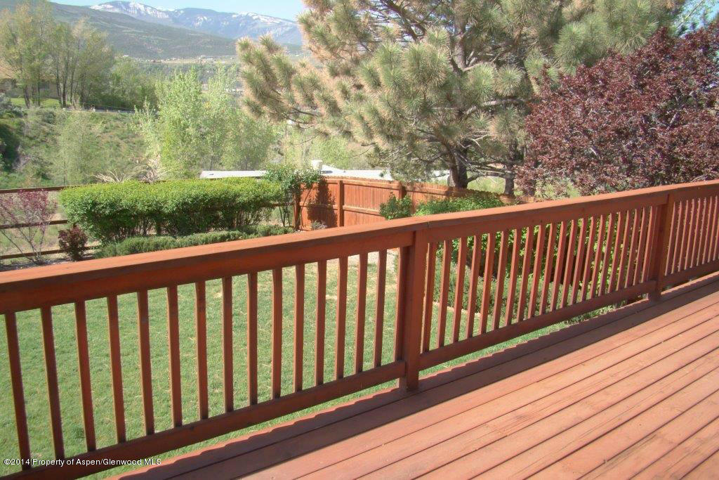 1001 Arnold Court Rifle, CO 81650 - Photo 29 of 39 a balcony with wooden floor and fence