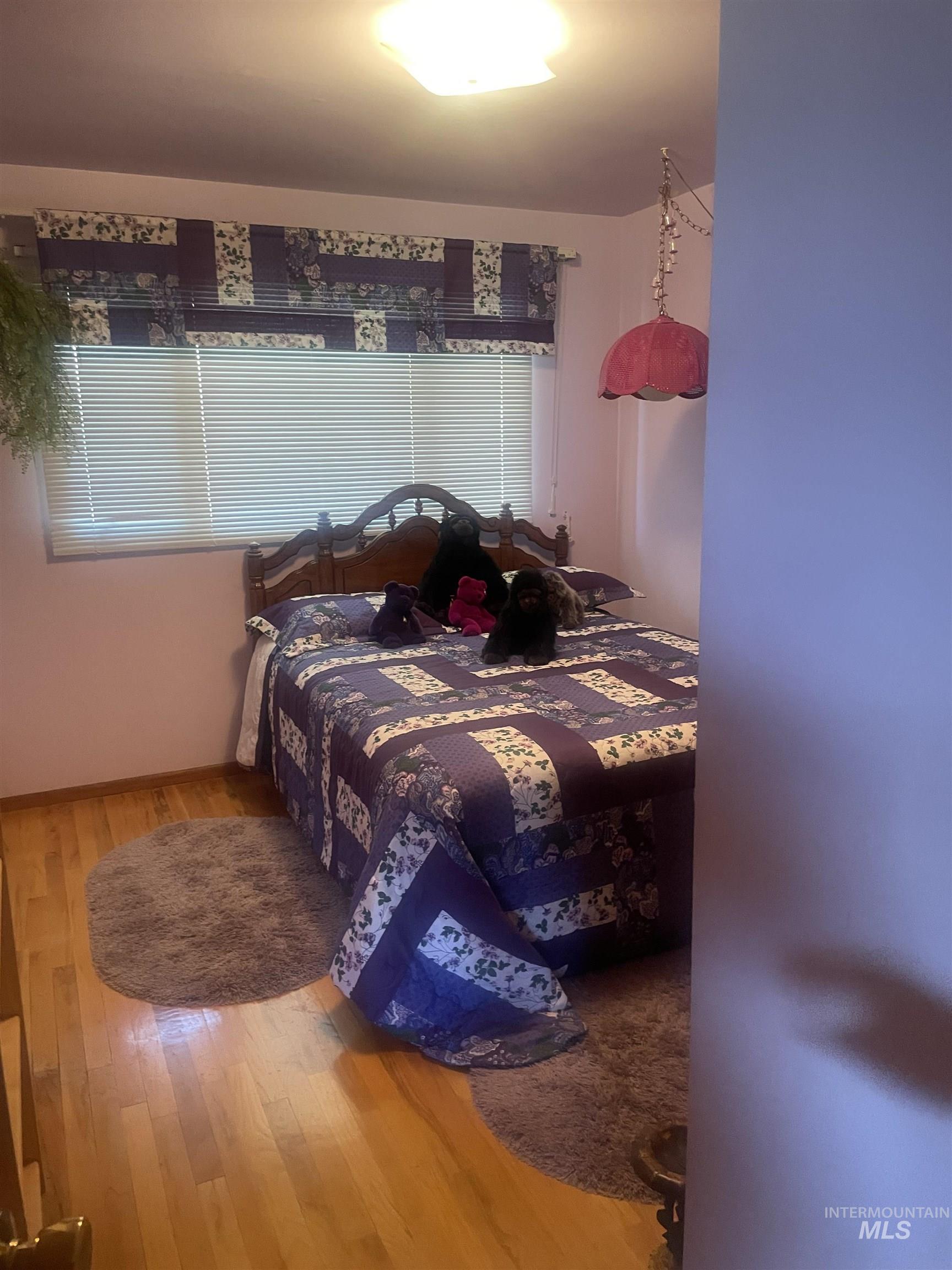 2002 Missman Road Council, ID 83612 - Photo 19 of 38 Bedroom with light wood-style flooring