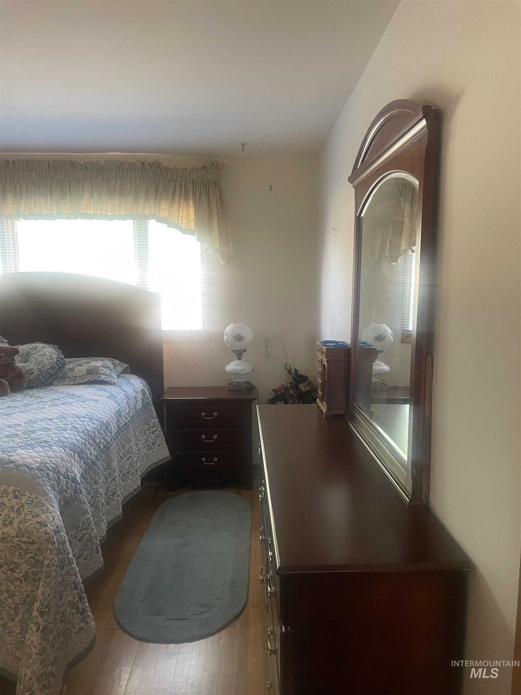 2002 Missman Road Council, ID 83612 - Photo 23 of 38 Bedroom featuring light wood-style flooring